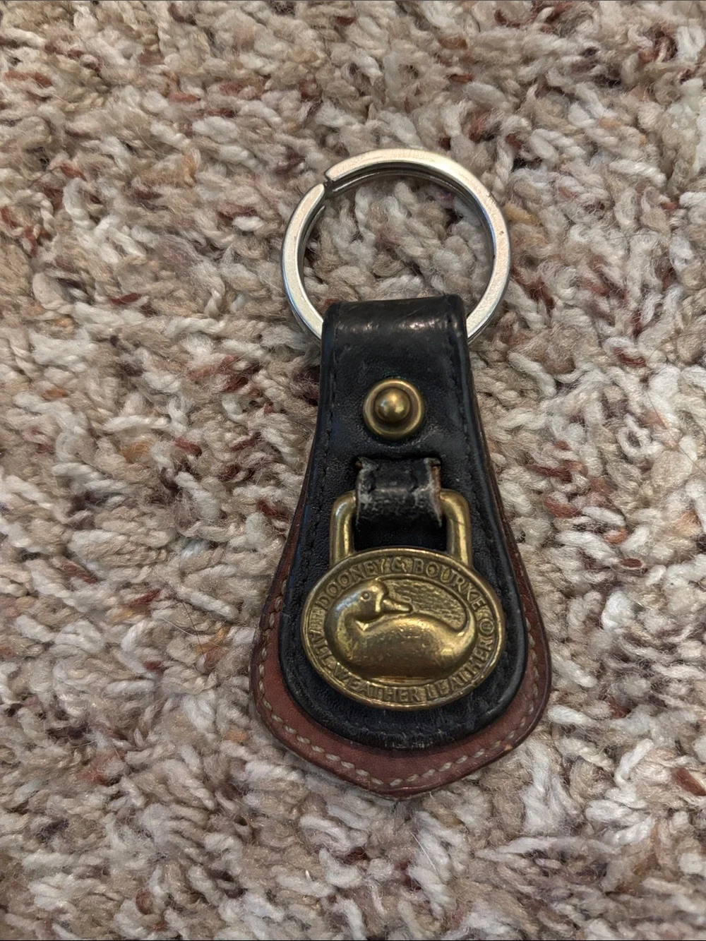 Dooney & Bourke Black and Brown Leather Key Fob with Brass Duck Emblem